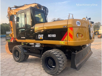 מחפר גלגלים CATERPILLAR M318D