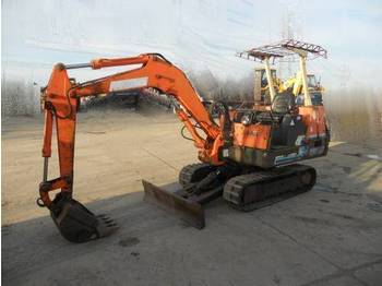 Takeuchi TB250 - מיני מחפר