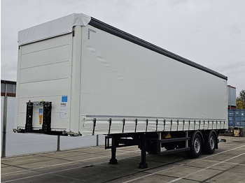 סמיטריילר עם וילונות צד