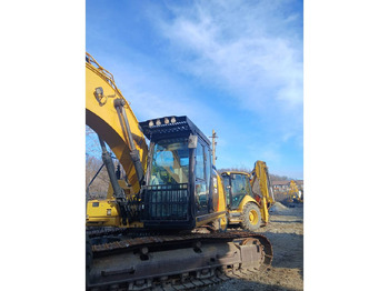 מחפר סורק CATERPILLAR 320FL