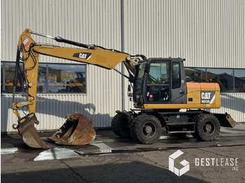 מחפר גלגלים CATERPILLAR M313D