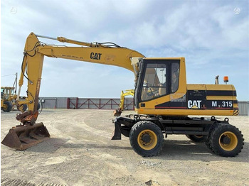 מחפר גלגלים CATERPILLAR M315