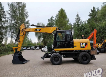 מחפר גלגלים CATERPILLAR M313D