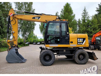 מחפר גלגלים CATERPILLAR M313D