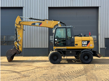 מחפר גלגלים CATERPILLAR M313D