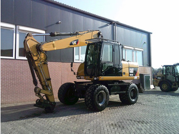 מחפר גלגלים CATERPILLAR M315D