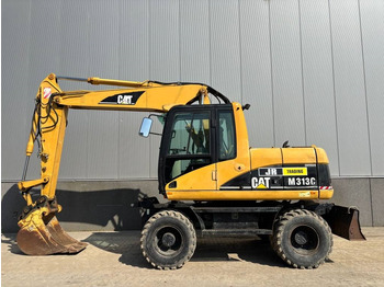 מחפר גלגלים CATERPILLAR M313C