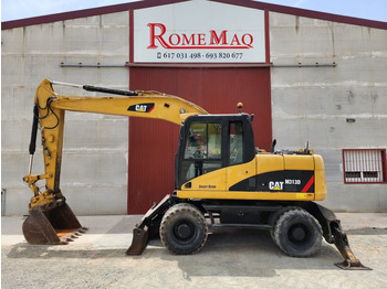 מחפר גלגלים CATERPILLAR M313D