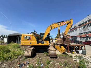 מחפר סורק CATERPILLAR 323