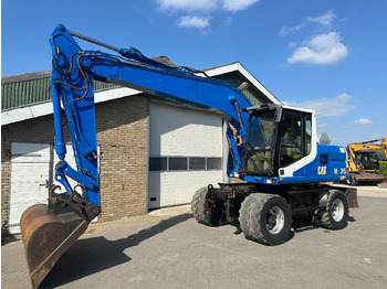 מחפר גלגלים CATERPILLAR M315