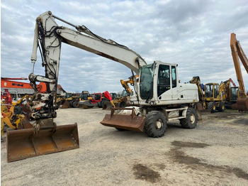 מחפר גלגלים CATERPILLAR M316D