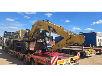 מחפר גלגלים CATERPILLAR M312