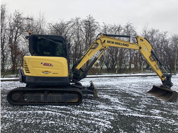 מיני מחפר NEW HOLLAND