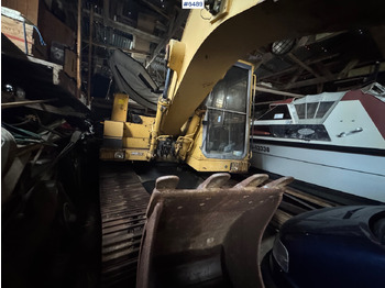 מחפר CATERPILLAR