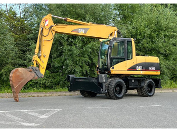 מחפר גלגלים CATERPILLAR M315C