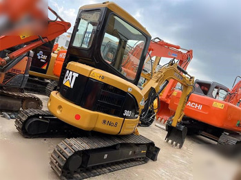 מיני מחפר CATERPILLAR 303