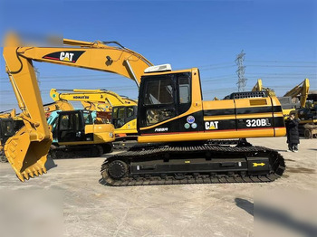 מחפר סורק CATERPILLAR 320BL