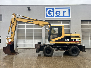 מחפר גלגלים CATERPILLAR M315