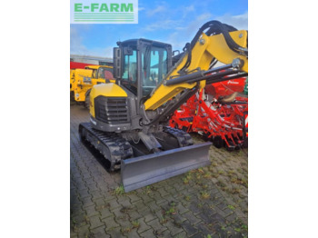 מיני מחפר NEW HOLLAND
