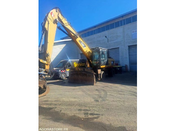 מחפר CATERPILLAR M318D
