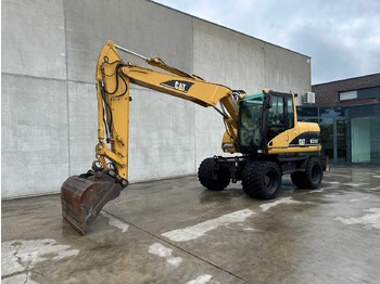 מחפר גלגלים CATERPILLAR M313C