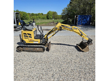 מיני מחפר NEW HOLLAND