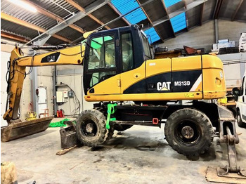 מחפר גלגלים CATERPILLAR M313D