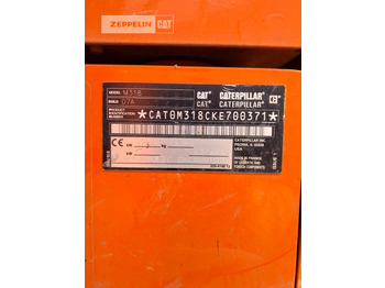 מחפר גלגלים CATERPILLAR M318