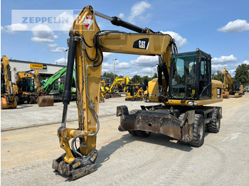 מחפר גלגלים CATERPILLAR M318D