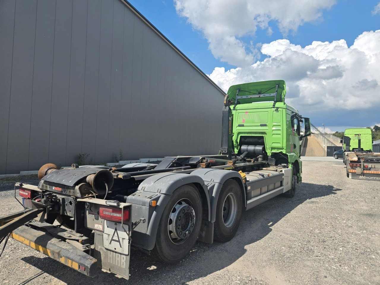 MAN TGS 26.510 Abrollkipper HIAB Lift -Lenkachse - משאית הרמת וו: תמונה 3 MAN TGS 26.510 Abrollkipper HIAB Lift -Lenkachse - משאית הרמת וו: תמונה 3