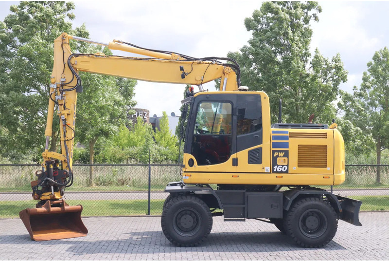 Komatsu PW 160-10 | ROTOTILT | NEW TIRES - מחפר גלגלים: תמונה 1 Komatsu PW 160-10 | ROTOTILT | NEW TIRES - מחפר גלגלים: תמונה 1