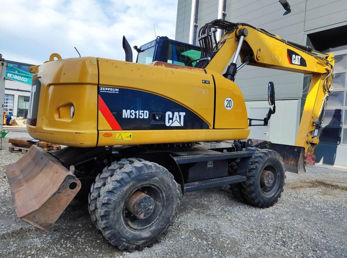 Caterpillar M315D - מחפר גלגלים: תמונה 4 Caterpillar M315D - מחפר גלגלים: תמונה 4