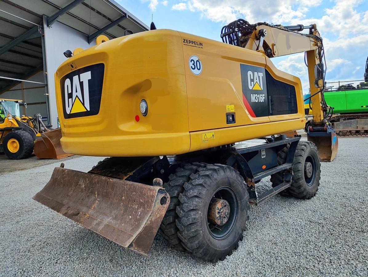 Caterpillar M316F - מחפר גלגלים: תמונה 4 Caterpillar M316F - מחפר גלגלים: תמונה 4