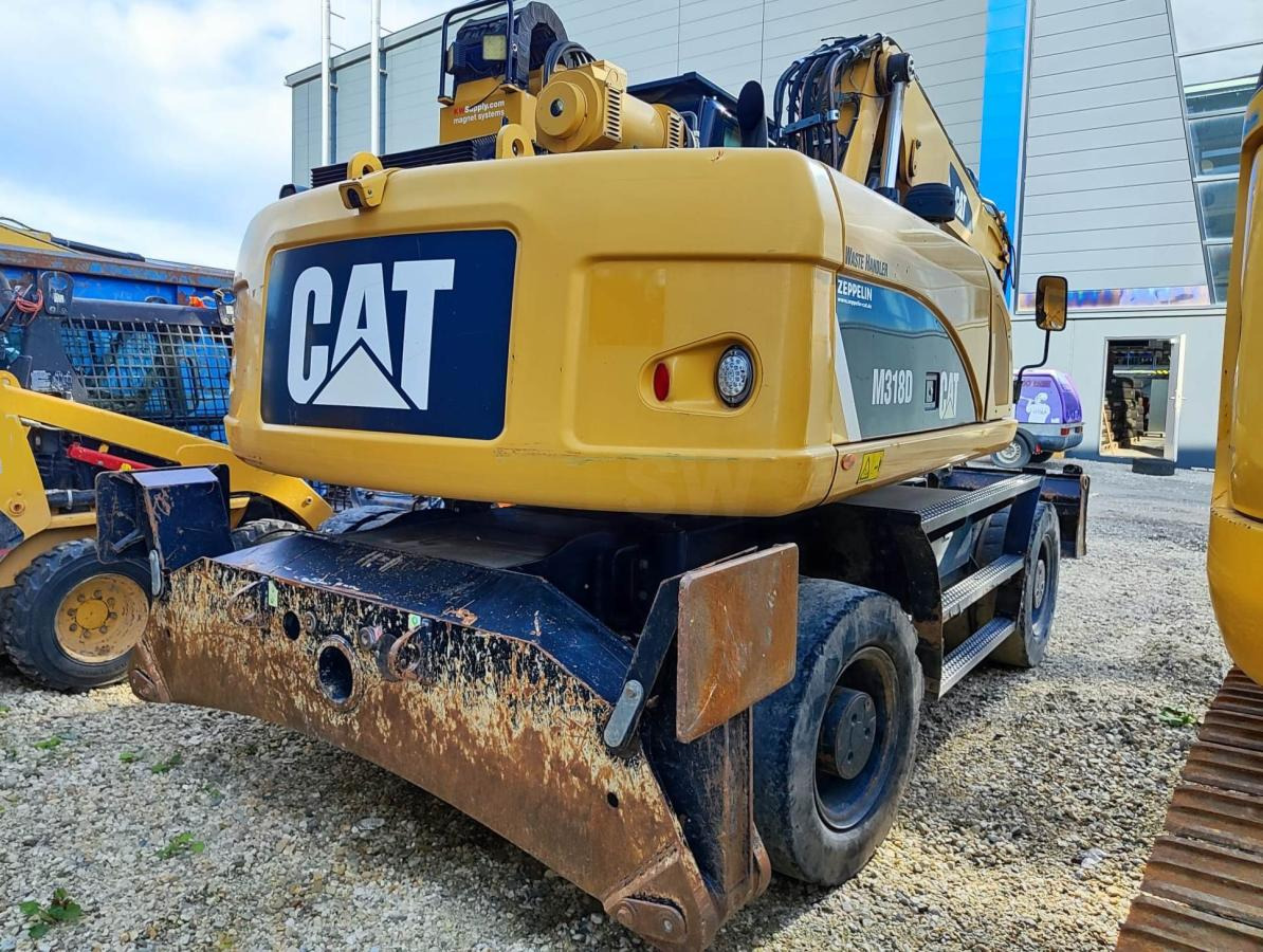 Caterpillar M318D MH - מחפר גלגלים: תמונה 4 Caterpillar M318D MH - מחפר גלגלים: תמונה 4