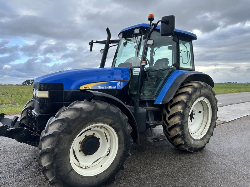New Holland TM 140 - טרקטור חקלאי: תמונה 1 New Holland TM 140 - טרקטור חקלאי: תמונה 1