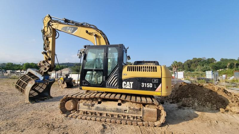 Caterpillar 315DL - מחפר סורק: תמונה 1 Caterpillar 315DL - מחפר סורק: תמונה 1