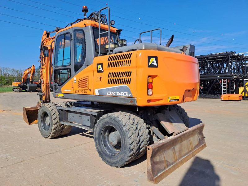 Doosan DX140W-5 - מחפר גלגלים: תמונה 2 Doosan DX140W-5 - מחפר גלגלים: תמונה 2