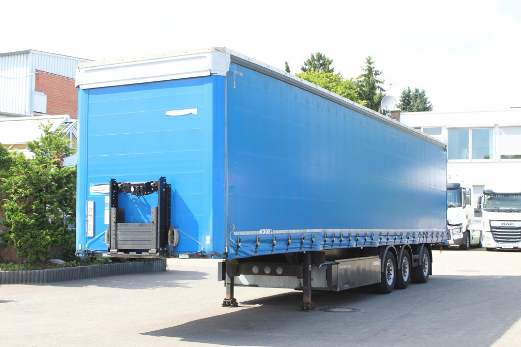 KOEGEL Standard Plane Liftachse Stapleraufnahme SAF - סמיטריילר עם וילונות צד: תמונה 1 KOEGEL Standard Plane Liftachse Stapleraufnahme SAF - סמיטריילר עם וילונות צד: תמונה 1