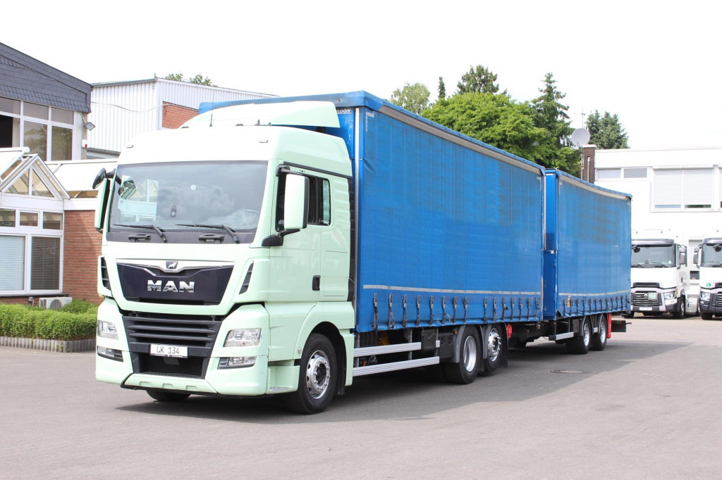 MAN TGX26.460 Durchlad Plane-Jumbo Retarder Hubdach - משאית וילונות צד: תמונה 1 MAN TGX26.460 Durchlad Plane-Jumbo Retarder Hubdach - משאית וילונות צד: תמונה 1