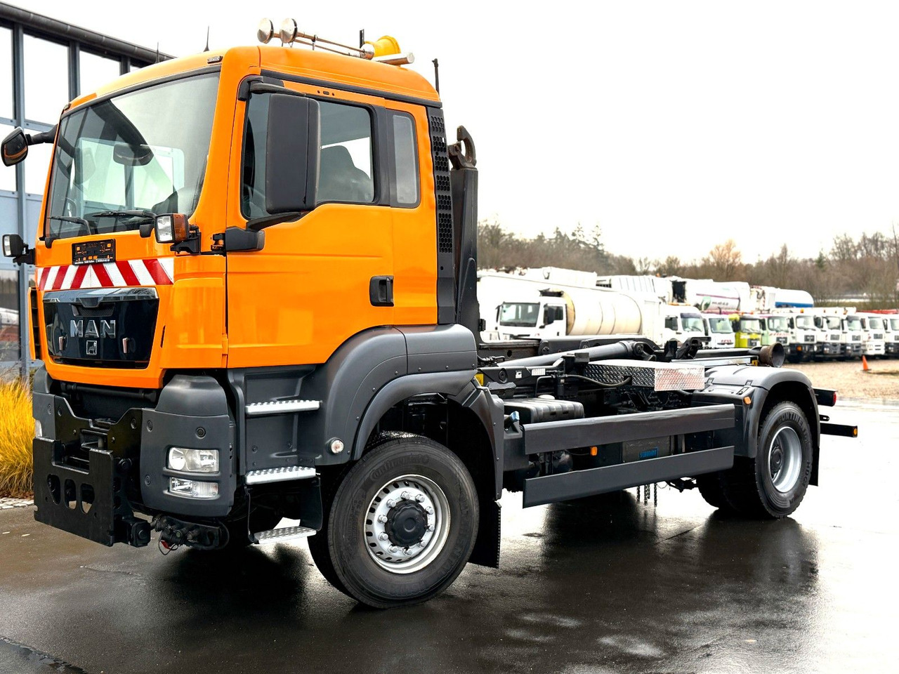 MAN TGS 18.360 4x4 Winterdienst Meiller Abroller - משאית הרמת וו: תמונה 1 MAN TGS 18.360 4x4 Winterdienst Meiller Abroller - משאית הרמת וו: תמונה 1