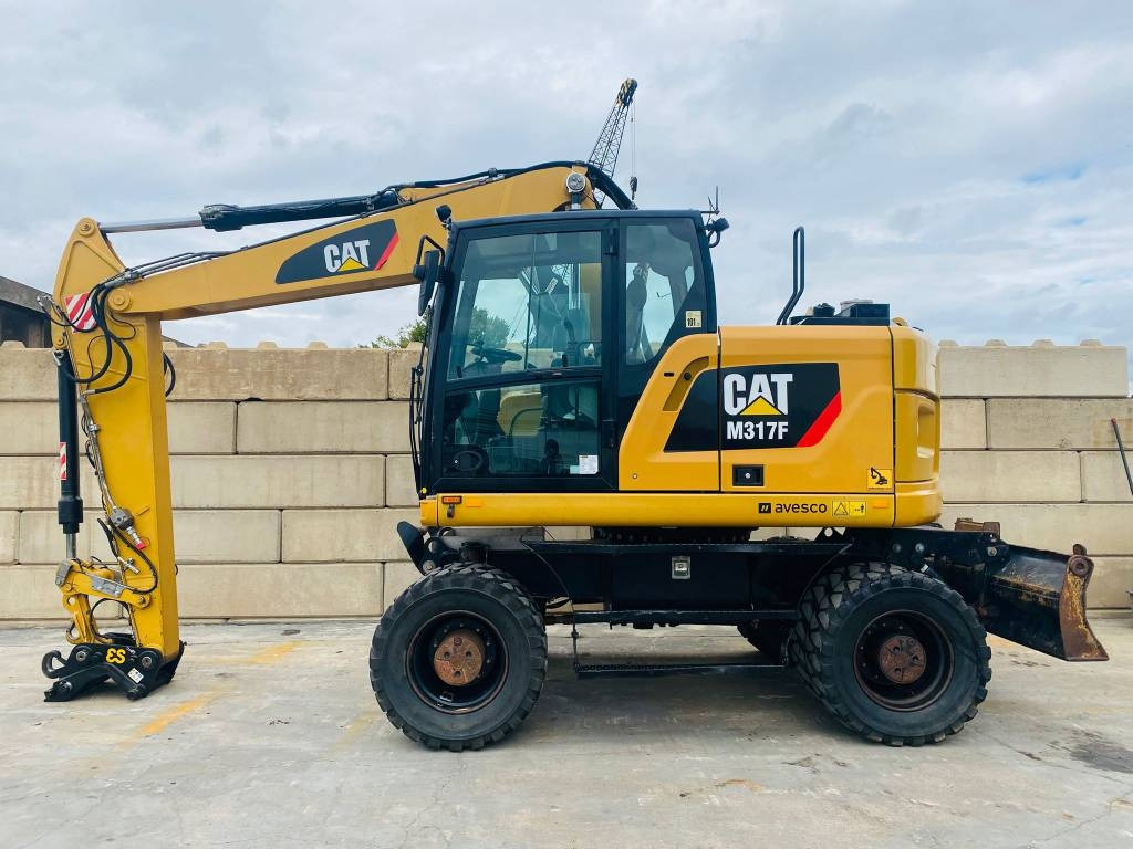CAT m317f - מחפר גלגלים: תמונה 1 CAT m317f - מחפר גלגלים: תמונה 1