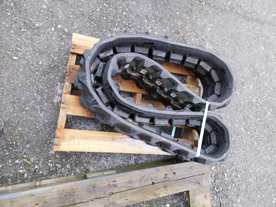 Neue Gummikette 230x96x35 Baggerkette Kette Caterpillar Takeuchi - רצועה עבור מכונת בנייה: תמונה 3 Neue Gummikette 230x96x35 Baggerkette Kette Caterpillar Takeuchi - רצועה עבור מכונת בנייה: תמונה 3