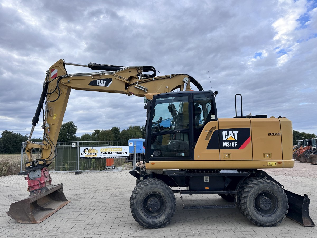 CATERPILLAR M 318 F Offset boom Deutsche Maschine Top ! - מחפר גלגלים: תמונה 1 CATERPILLAR M 318 F Offset boom Deutsche Maschine Top ! - מחפר גלגלים: תמונה 1