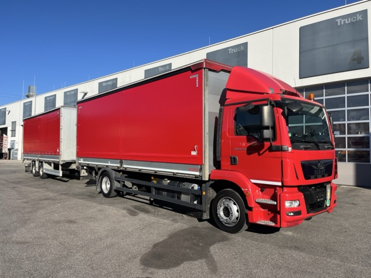 MAN TGM 18.320 4x2 BL Durchladbar - mit Tandemhänger - משאית וילונות צד: תמונה 1 MAN TGM 18.320 4x2 BL Durchladbar - mit Tandemhänger - משאית וילונות צד: תמונה 1