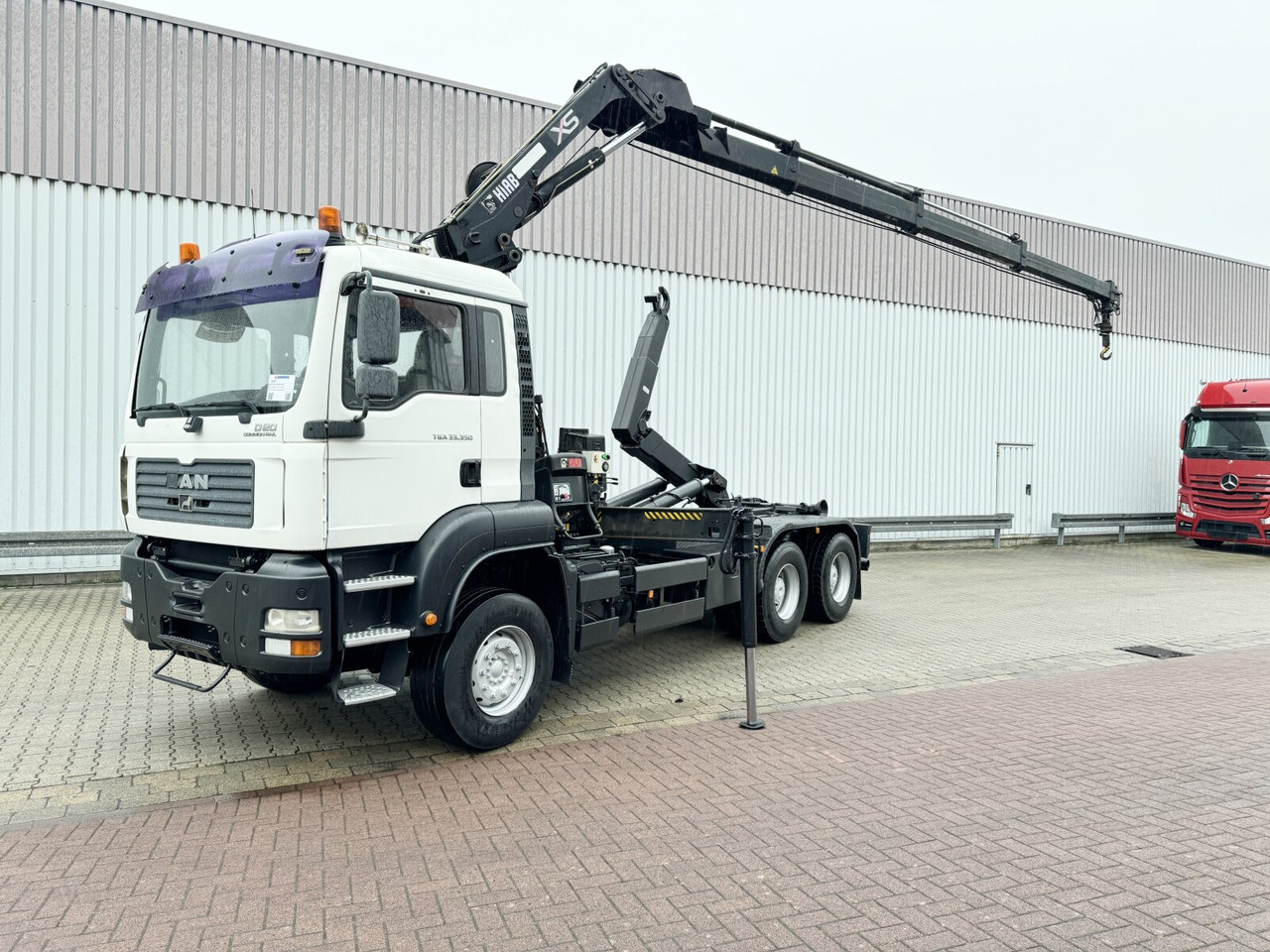 MAN TGA 33.350 6X4 BB TGA 33.350 6X4 BB mit Kran Hiab 166 E-3 HiDuo, Funk - משאית הרמת וו, משאית מנוף: תמונה 1 MAN TGA 33.350 6X4 BB TGA 33.350 6X4 BB mit Kran Hiab 166 E-3 HiDuo, Funk - משאית הרמת וו, משאית מנוף: תמונה 1