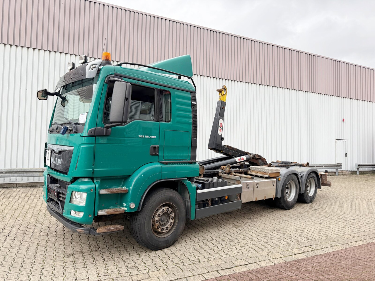 MAN TGS 26.480 6x4 BL TGS 26.480 6x4 BL, Motorabtrieb, Navi, Intarder, Hyva 20.60 S - משאית הרמת וו: תמונה 1 MAN TGS 26.480 6x4 BL TGS 26.480 6x4 BL, Motorabtrieb, Navi, Intarder, Hyva 20.60 S - משאית הרמת וו: תמונה 1