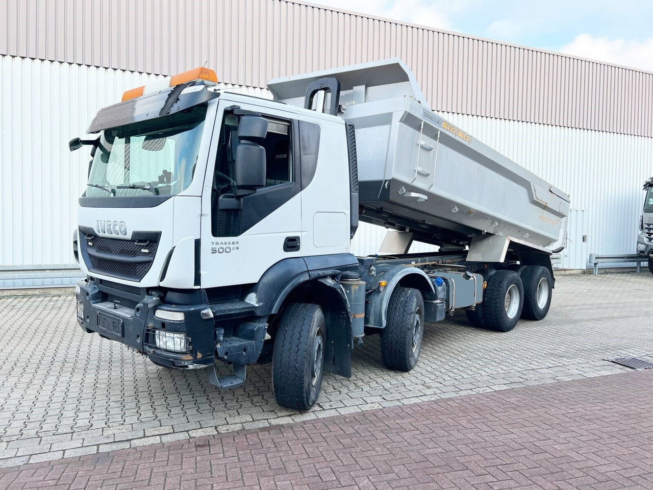 Trakker AT410T50 8x4 Trakker AT410T50 8x4, Stahlmulde ca. 16m³, hydr. Heckklappe - מזהיר: תמונה 1 Trakker AT410T50 8x4 Trakker AT410T50 8x4, Stahlmulde ca. 16m³, hydr. Heckklappe - מזהיר: תמונה 1