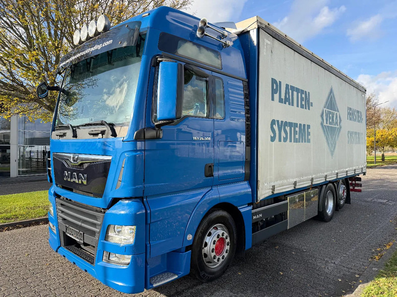 MAN TGX 26.500 STANDKLIMA + 6X2 + EURO 6 - משאית וילונות צד: תמונה 1 MAN TGX 26.500 STANDKLIMA + 6X2 + EURO 6 - משאית וילונות צד: תמונה 1