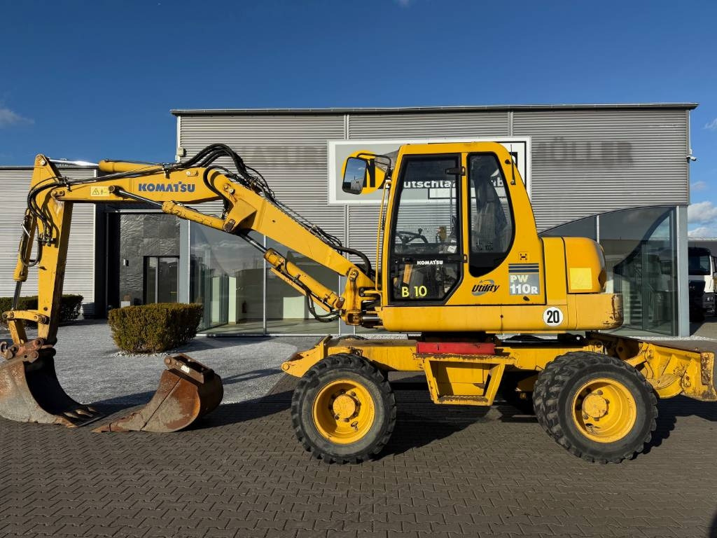 Komatsu PW 110 - מחפר גלגלים: תמונה 1 Komatsu PW 110 - מחפר גלגלים: תמונה 1