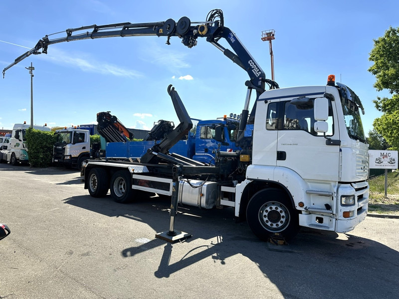 MAN TGA 26.310 6X2 HOOKLIFT + CRANE COPMA 160.4 + JIB J2 + WINCH - RADIO - LIFT + STEERING AXLE - EURO 3 - BE - משאית הרמת וו, משאית מנוף: תמונה 1 MAN TGA 26.310 6X2 HOOKLIFT + CRANE COPMA 160.4 + JIB J2 + WINCH - RADIO - LIFT + STEERING AXLE - EURO 3 - BE - משאית הרמת וו, משאית מנוף: תמונה 1